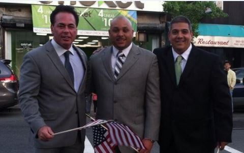 A Facebook photo from June where Hector Hernandez (far right) poses with Commissioner Count Wiley (far left) and Pastor Rafael Sanchez, Jr. 