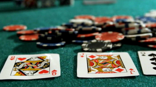 A stock photo of gambling chips and cards being distributed via wftv.com