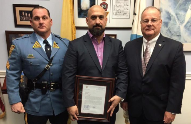 Michael Citarella (middle), the managing partner of Hoboken's Texas Arizona, was honored by the New Jersey State Police yesterday. Photo via NJSP Facebook. 