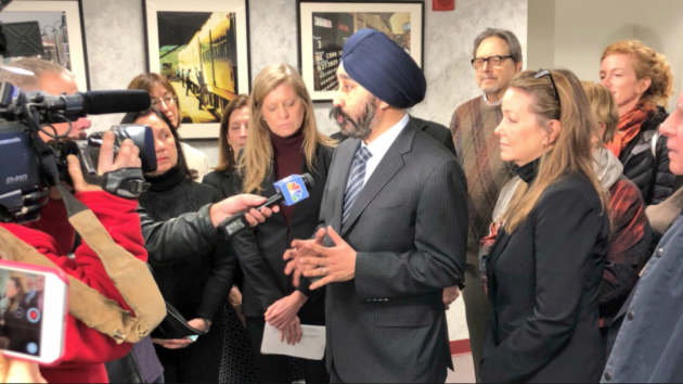 Hoboken Mayor Ravi Bhalla, joined by 2nd Ward Councilwoman Tiffanie Fisher, speaks to the media after this morning's NJ Transit board meeting was cancelled. Twitter photo