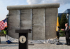 Hudson County officials celebrate a piece of the Berlin Wall coming to Secaucus park