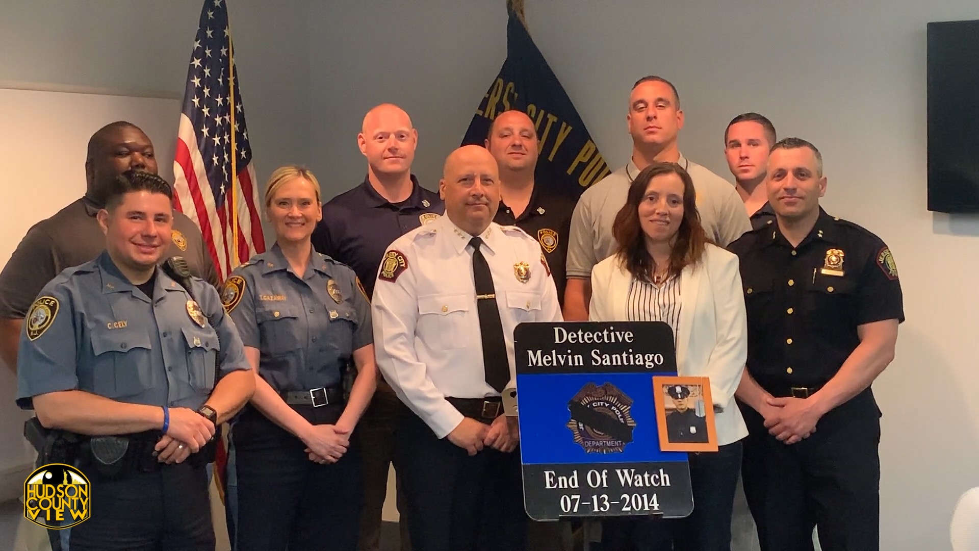 Jersey City, New Providence police present 5k check to slain Det. Melvin Santiago's mother