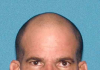 Police: Man stopped for talking on cell phone in Guttenberg busted with handgun
