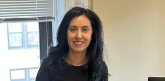 Hoboken Corp. Counsel Quiñones Perez leaving City Hall, post coming back in house